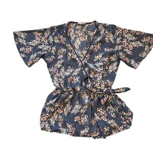 Blue floral top with pink and white flowers